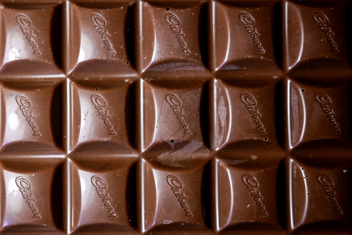 A photograph taken on December 23, 2024 shows a Cadbury's chocolates tablet displayed on a table in Liverpool, in north west England. (Photo by Paul ELLIS / AFP)
