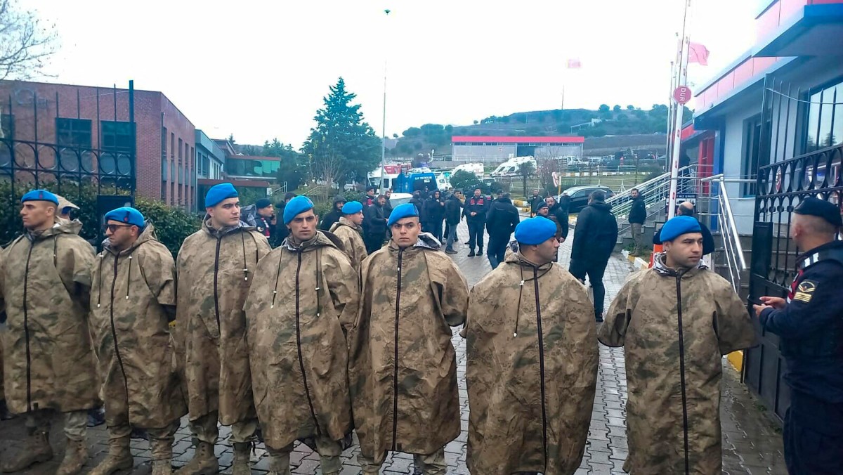 This handout image taken and released by the Demiroren News Agency (DHA) on December 24, 2024, shows Turkish soldiers forming a cordon as part of security measures near the building where the explosion occurred in Balikesir. Photo by DHA (Demiroren News Agency) / AFP.