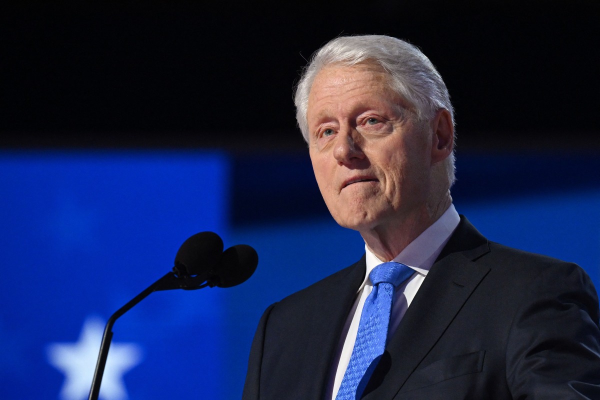 (FILES) Former US President Bill Clinton speaks on the third day of the Democratic National Convention (DNC) at the United Center in Chicago, Illinois, on August 21, 2024. (Photo by SAUL LOEB / AFP)
