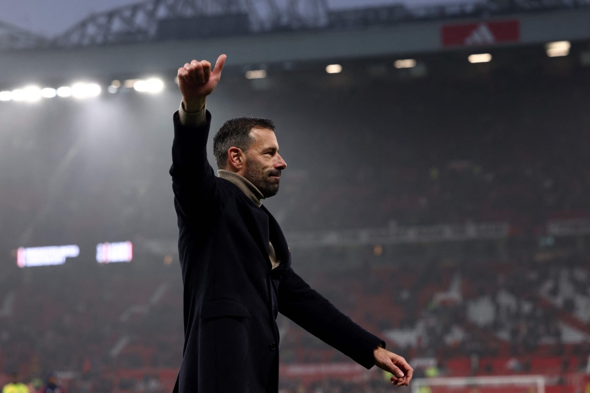 Manchester United's former Dutch interim head coach Ruud van Nistelrooy acknowledges fans at the end of the English Premier League football match between Manchester United and Leicester City at Old Trafford in Manchester, north west England, on November 10, 2024. (Photo by Darren Staples / AFP)
