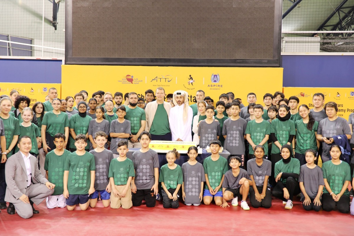 Participants of the Future Stars training camp pose for a photo with officials at the Aspire Academy.