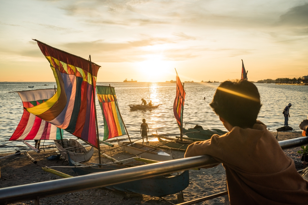 Colorful sails, called vinta, of the Sama Bajau line the shore of Zamboanga City during its weeks-long Hermosa Festival. Photo by Martin San Diego for The Washington Post.