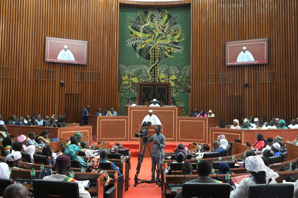 Senegalese Prime Minister Ousmane Sonko addresses lawmakers during his policy speech in the National Assembly in Dakar on December 27, 2024. (Photo by Seyllou / AFP)