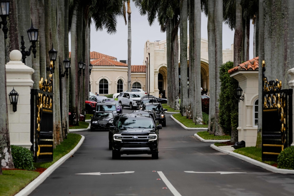 US President-elect Donald Trump is driven from the Trump International Golf Club in a convoy of vehicles on December 28, 2024 in Palm Beach, Florida. Eva Marie Uzcategui/Getty Images/AFP 