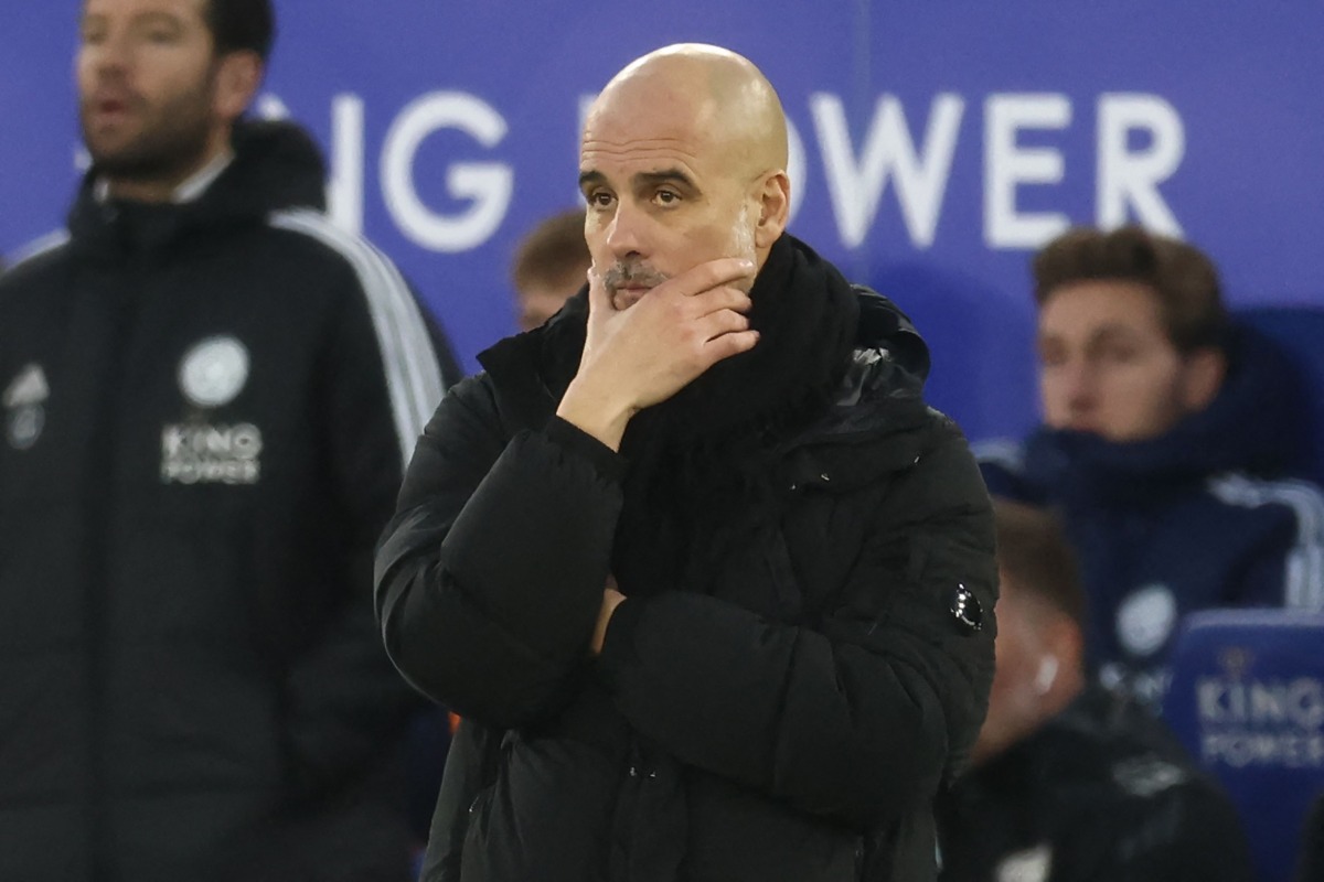 Manchester City's Spanish manager Pep Guardiola looks on during the English Premier League football match between Leicester City and Manchester City at King Power Stadium in Leicester, central England on December 29, 2024. (Photo by Darren Staples / AFP)