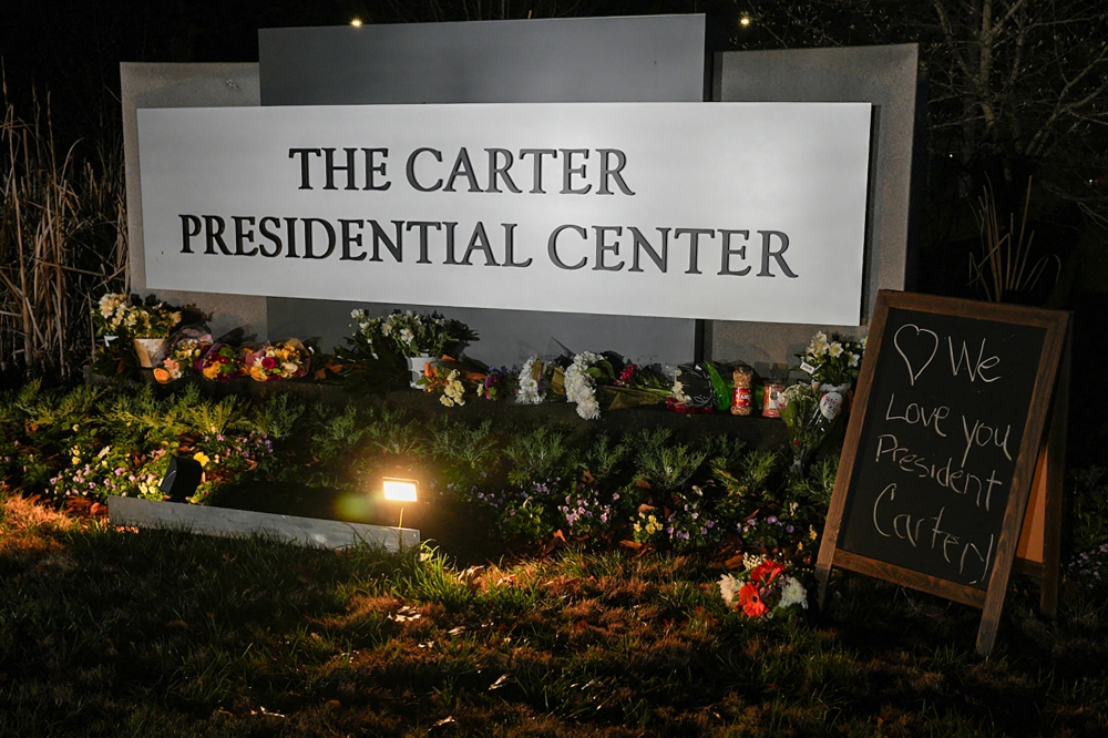 A memorial sprung up at The Carter Presidential Center following the death of Jimmy Carter on December 29, 2024 in Atlanta, Georgia. Megan Varner/Getty Images/AFP 