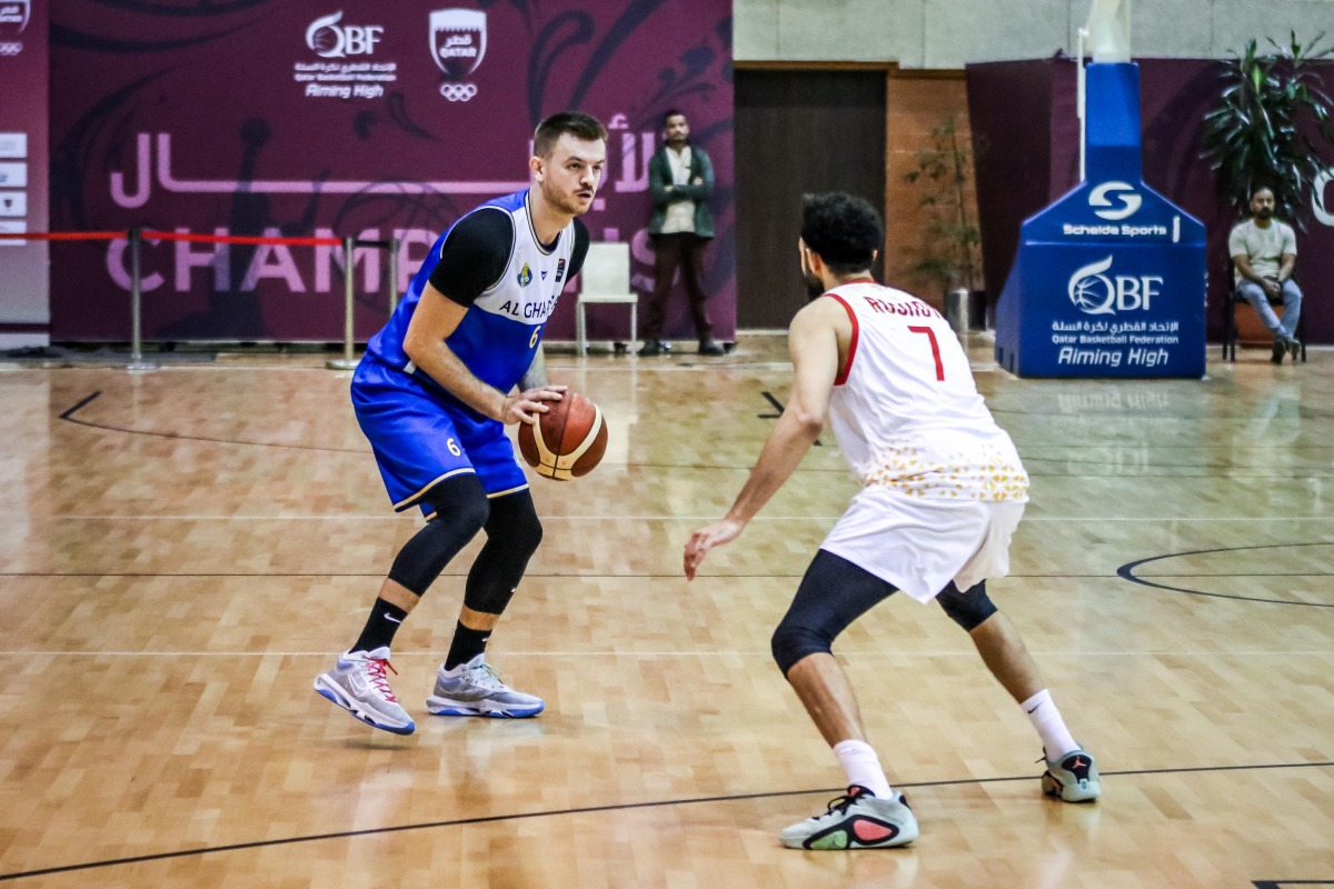 Most Valuable Player of the match, Nedim Muslic (left) scored 30 points and made nine rebounds and four assists.