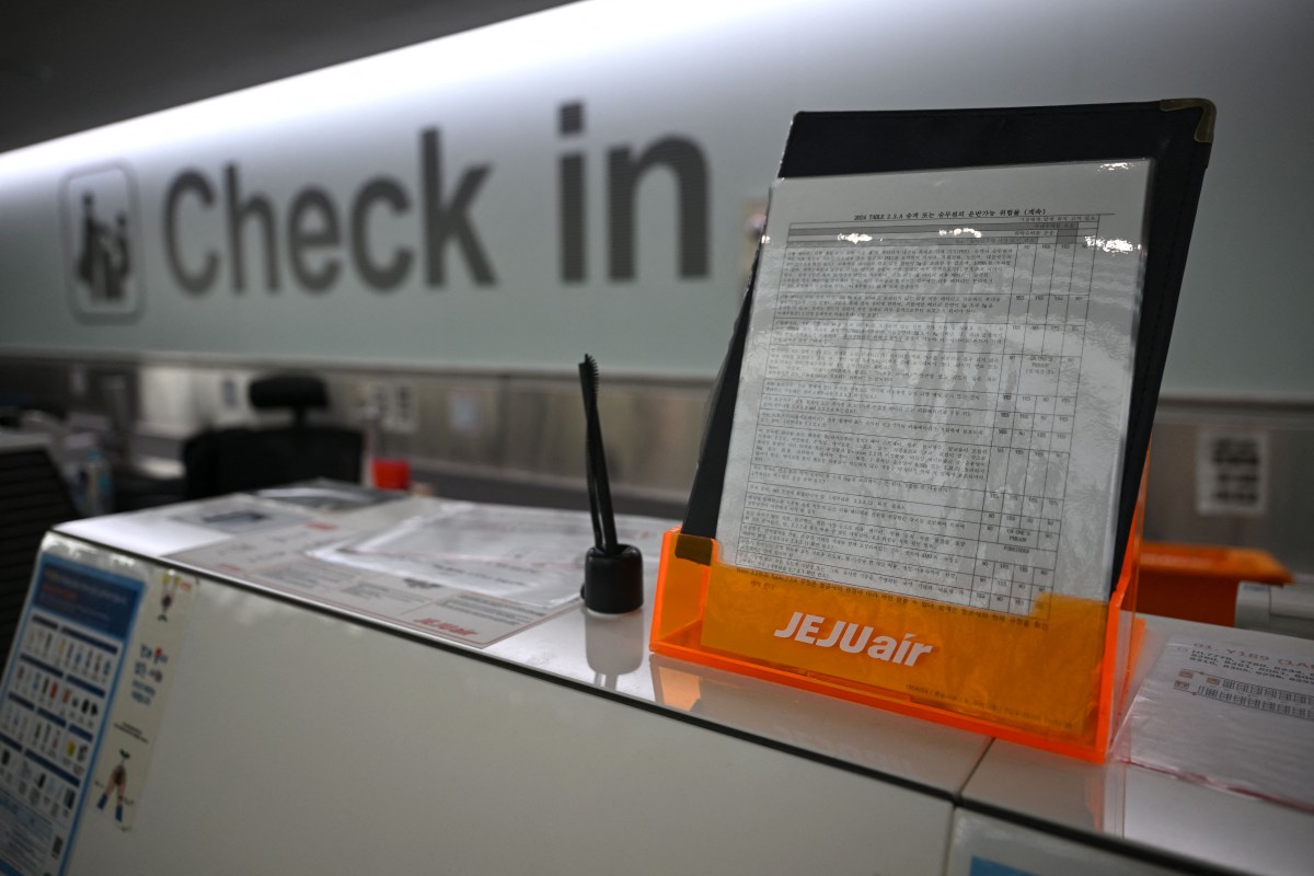 Photo used for representational purposes. A check-in desk of Jeju Air is seen at Muan International Airport in Muan, some 288 kilometres southwest of Seoul on December 30, 2024. Photo by JUNG YEON-JE / AFP.