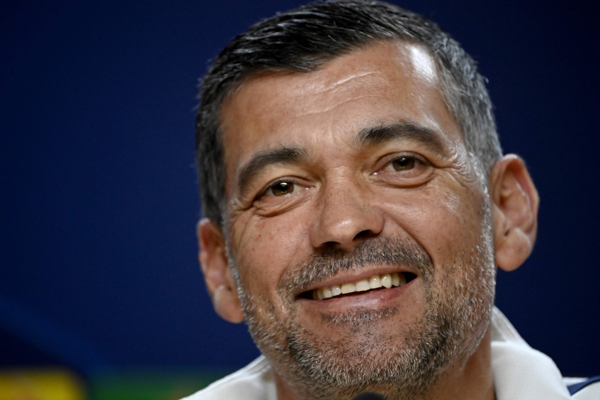 (FILES) FC Porto's Portuguese coach Sergio Conceicao smiles during a press conference on the eve of their UEFA Champions League last 16 first leg football match against Arsenal FC at the Dragao stadium in Porto, on February 20, 2024. (Photo by MIGUEL RIOPA / AFP)