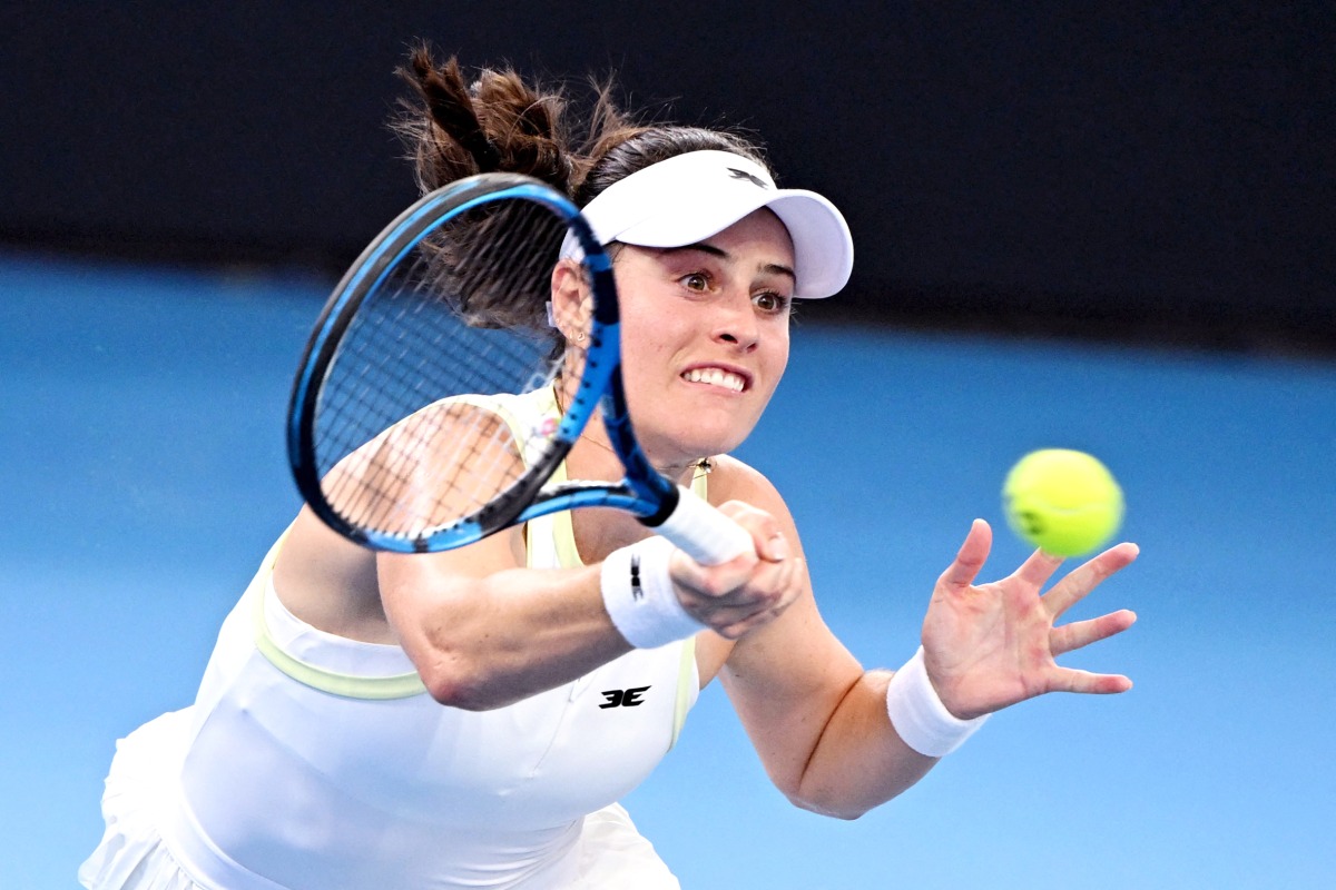 Kimberly Birrell of Australia hits a return during her singles match against Emma Navarro of the US.