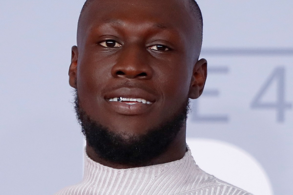 British grime and hip-hop artist Stormzy poses on the red carpet on arrival for the BRIT Awards 2020 in London on February 18, 2020. Photo by Tolga AKMEN / AFP