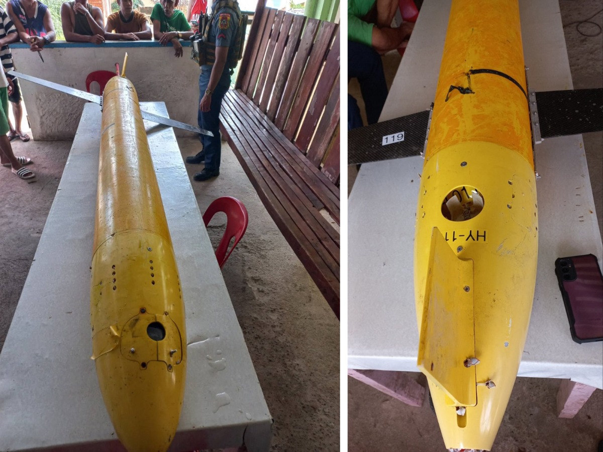 These handout photos taken on December 30, 2024 and received from the the Philippine National Police (PNP) Bicol Region on January 2, 2025 shows a submarine drone suspected to be from China found by fishermen off the coast of San Pascual in Masbate province. Photos by Handout / Philippine National Police (PNP) Bicol Region / AFP