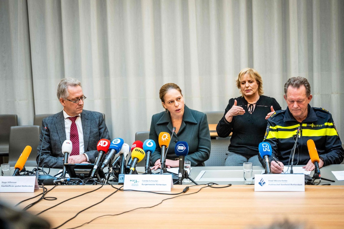 Hugo Hillenaar, chief public prosecutor of Rotterdam, Carola Schouten, Mayor of Rotterdam, and Fred Westerbeke, police chief Rotterdam deliver a press conference on three deadly shootings in Rotterdam on January 3, 2024. Photo by Josh Walet / ANP / AFP