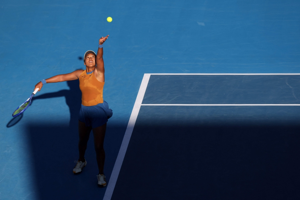 Japan's Naomi Osaka serves against USA's Alycia Parks during their women's singles semi-final match at the WTA Auckland Classic tennis tournament in Auckland on January 4, 2025. (Photo by Michael Bradley / AFP)