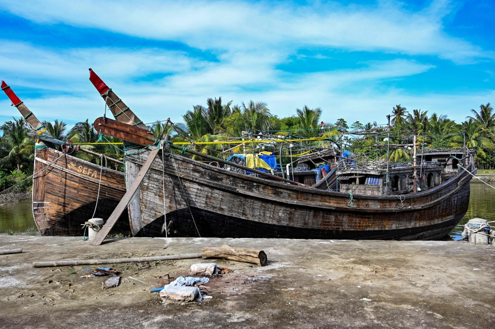 This file photo intended for representational purposes only, taken on November 18, 2023 in the Batee subdistrict in Aceh Province's Pidie region shows two boats that carried Rohingya refugees to Indonesia on November 14 and November 15, 2023. (Photo by Chaideer Mahyuddin / AFP)


