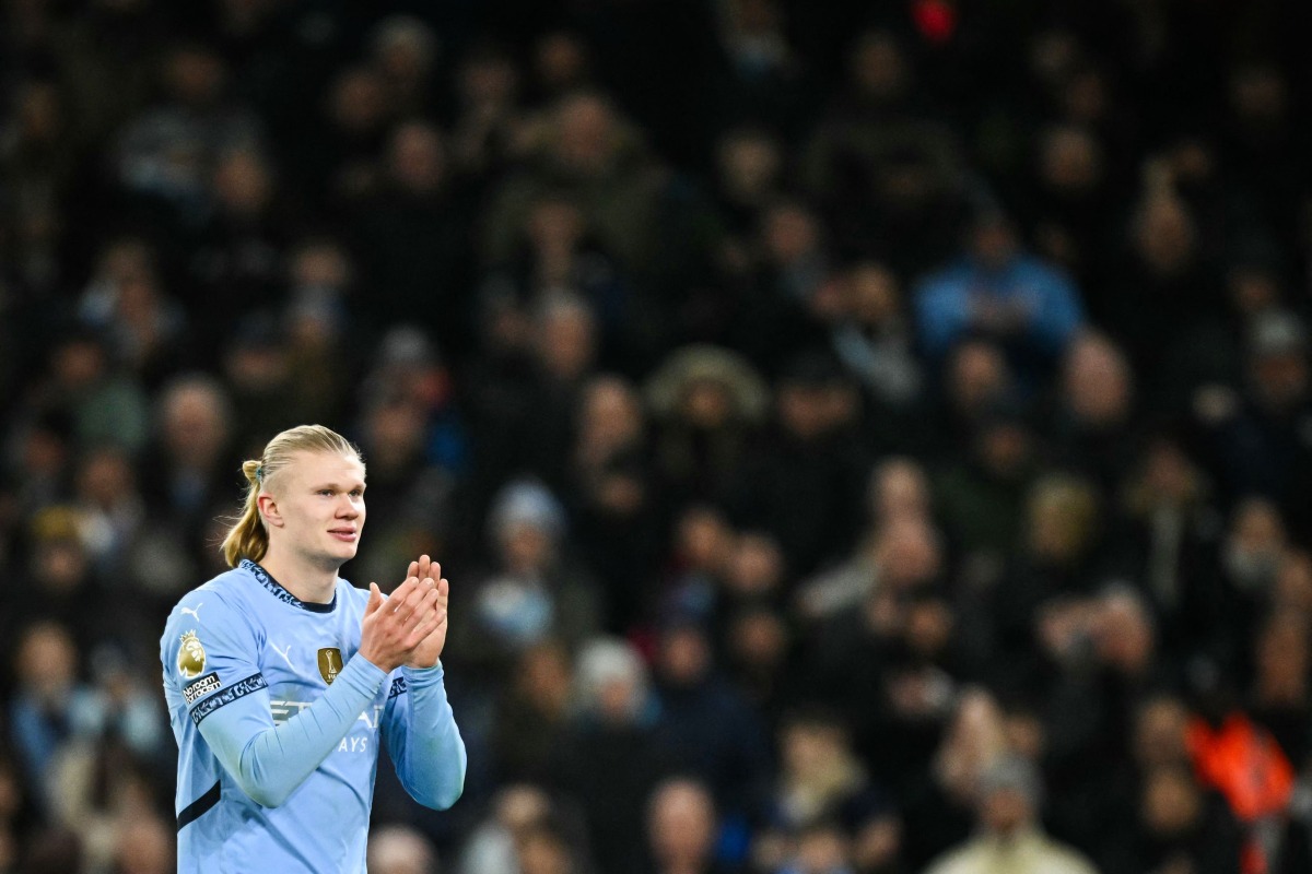 Manchester City's Norwegian striker #09 Erling Haaland applauds as he leaves the pitch during the English Premier League football match between Manchester City and West Ham United at the Etihad Stadium in Manchester, north west England, on January 4, 2025. (Photo by Oli SCARFF / AFP)