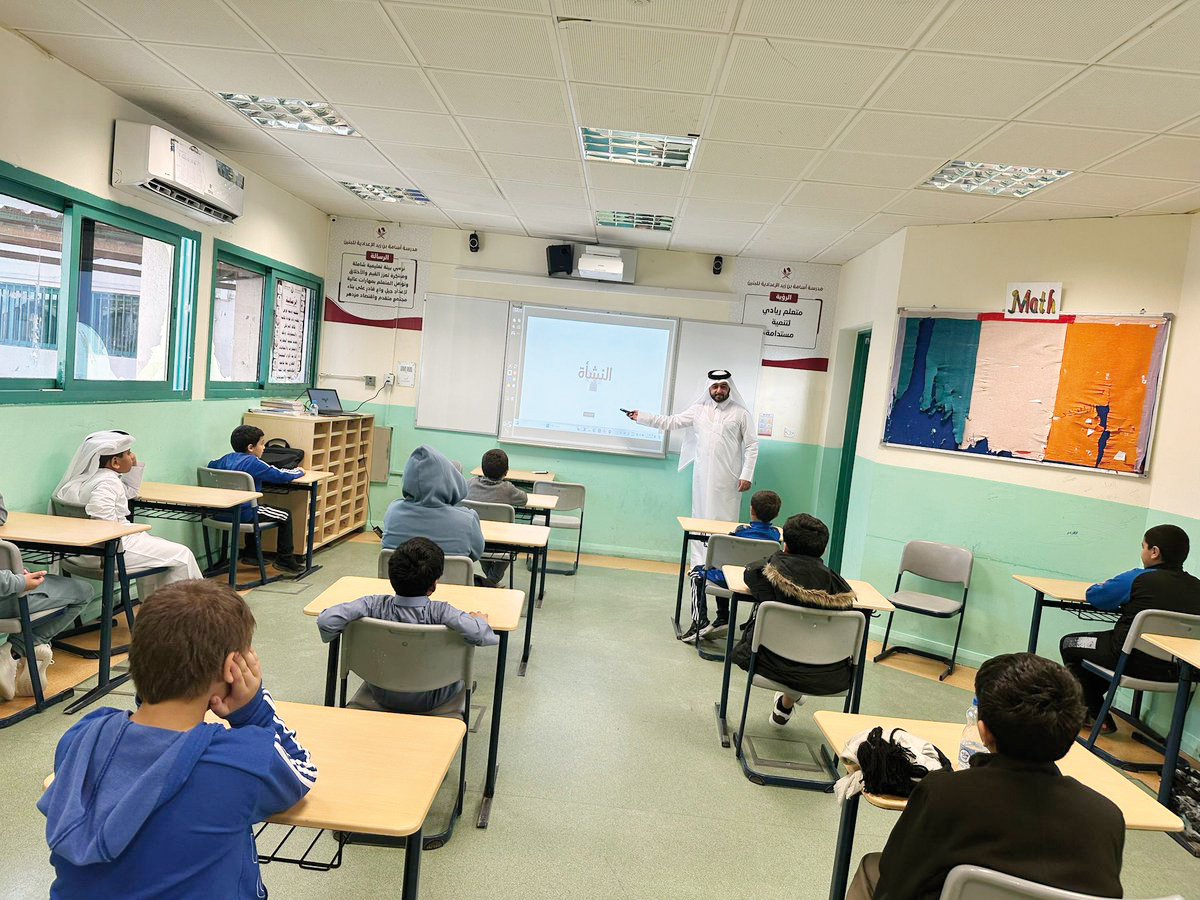 An NHRC official delivers a lecture in a classroom.