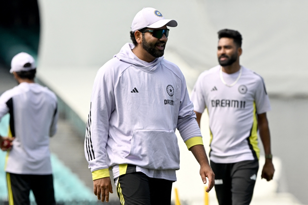 India's Rohit Sharma attends a warmup session before the start of day three of the fifth Test match between Australia and India at the Sydney Cricket Ground on January 5, 2025. (Photo by Saeed Khan / AFP) /