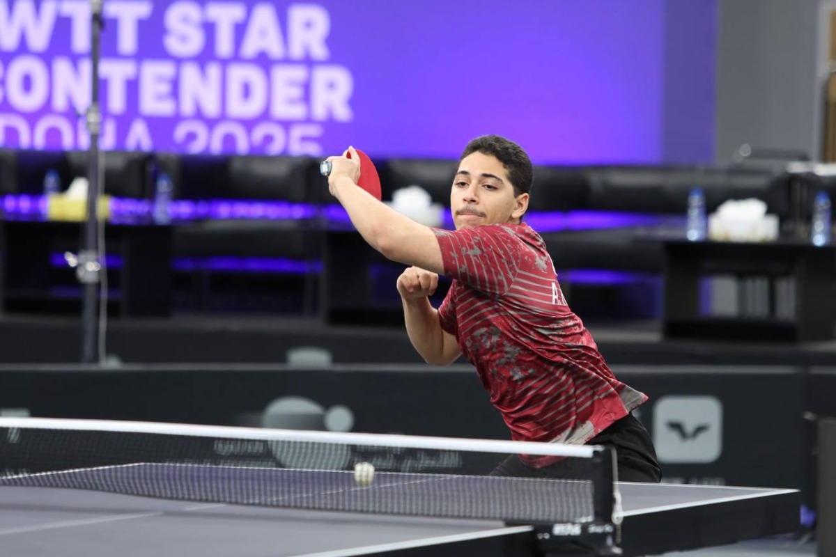 Qatar's Ahmed Korani in action during his match against Singapore's Li Yan Jun.