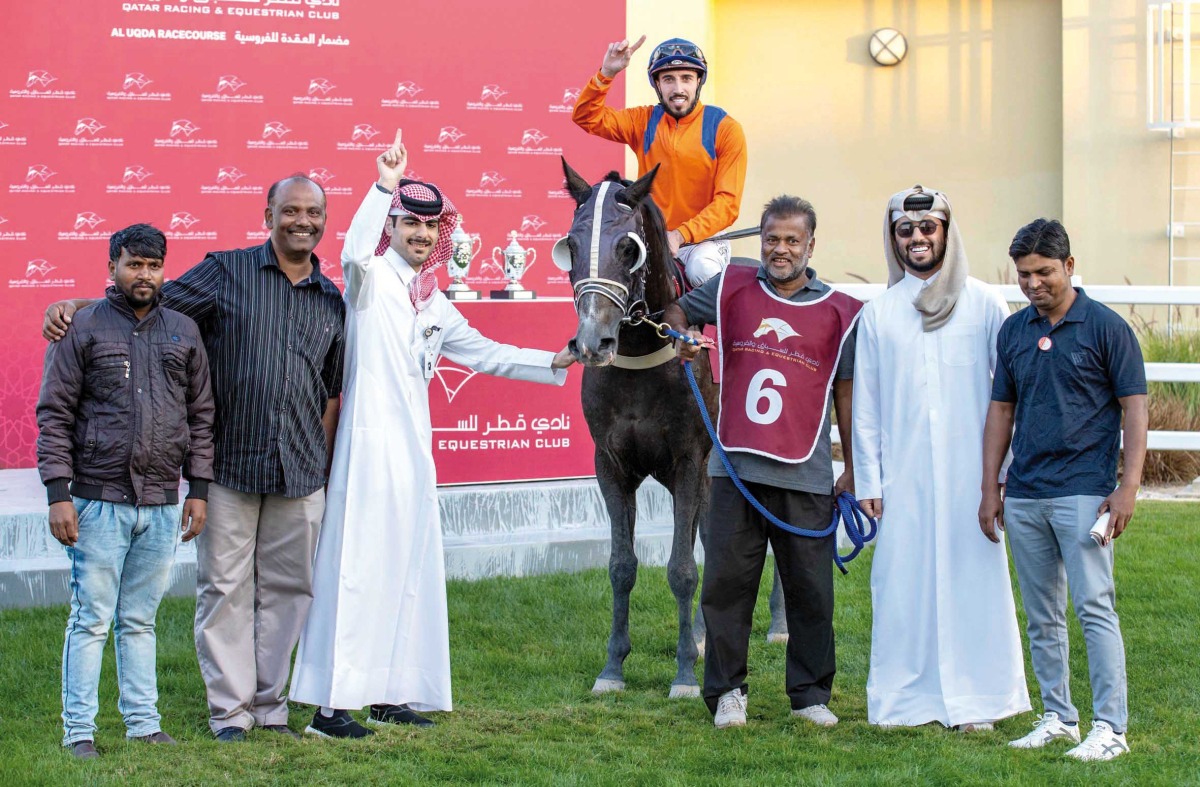 The connections of El Ghazi celebrate their Al Gharafa Cup victory.