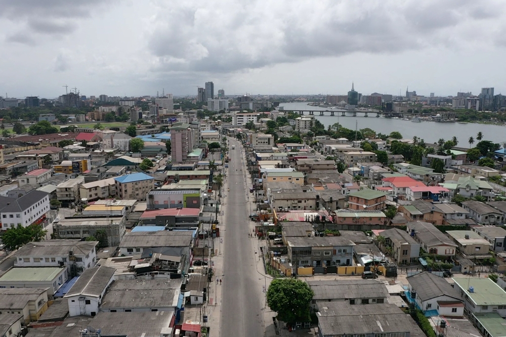 File: An aerial view shows empty streets in Lagos on March 31, 2020, after Nigeria locked down its economic hub. (Photo by Pierre Favennec / AFP)
