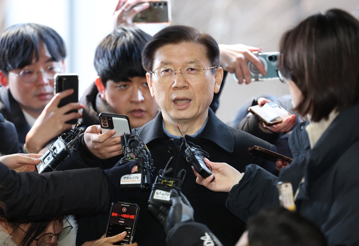 Head of the Presidential Security Service (PSS) Park Chong-jun (C) arrives outside the National Office of Investigation in Seoul on January 10, 2025. Photo by YONHAP / AFP