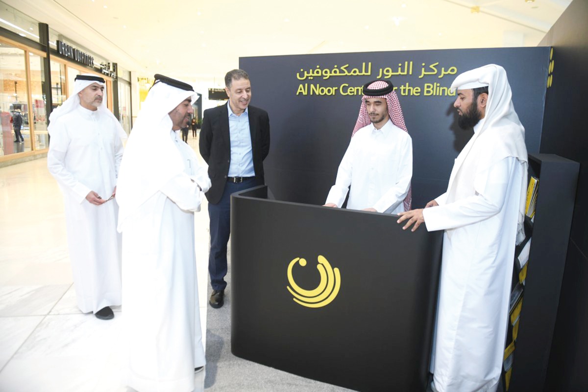 Officials at the Al Noor Center for the Blind information booth recently.