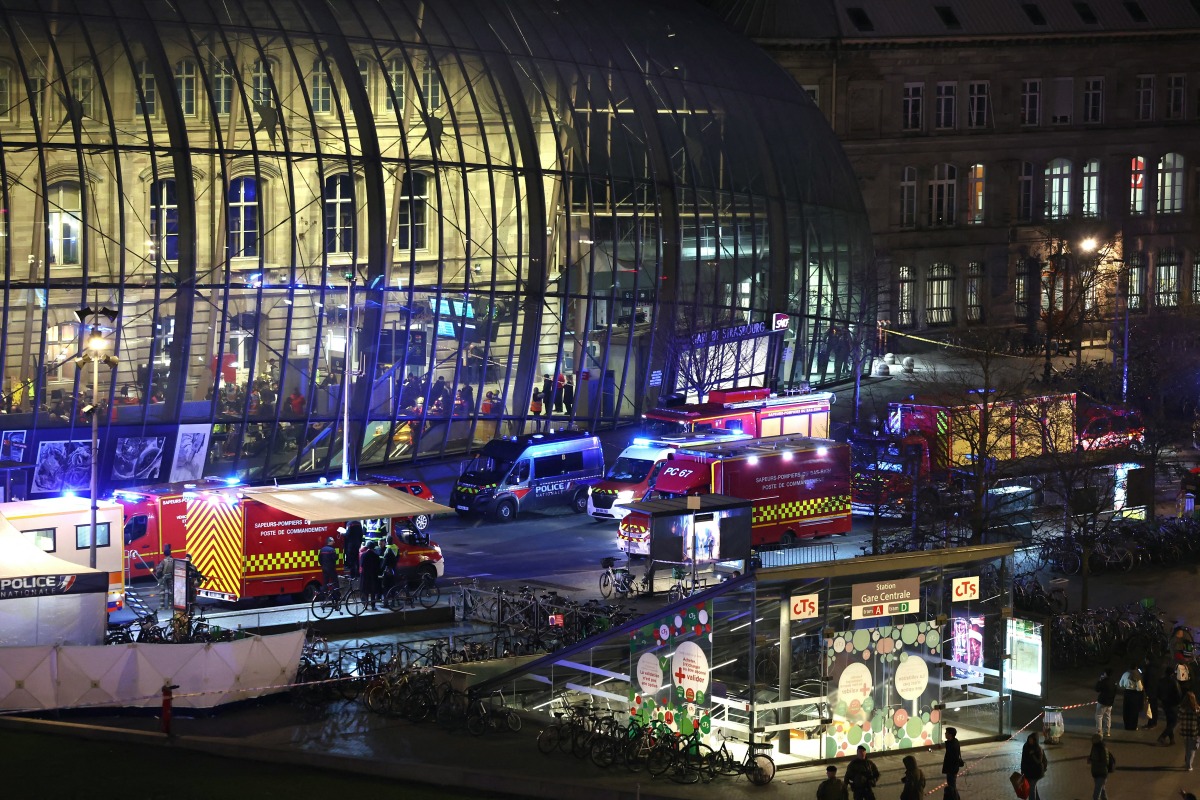 Firefighters' and rescue vehicles are stationed outside the Strasbourg railway station following a collision of two trams, in Strasbourg, eastern France, on January 11, 2025. Photo by FREDERICK FLORIN / AFP