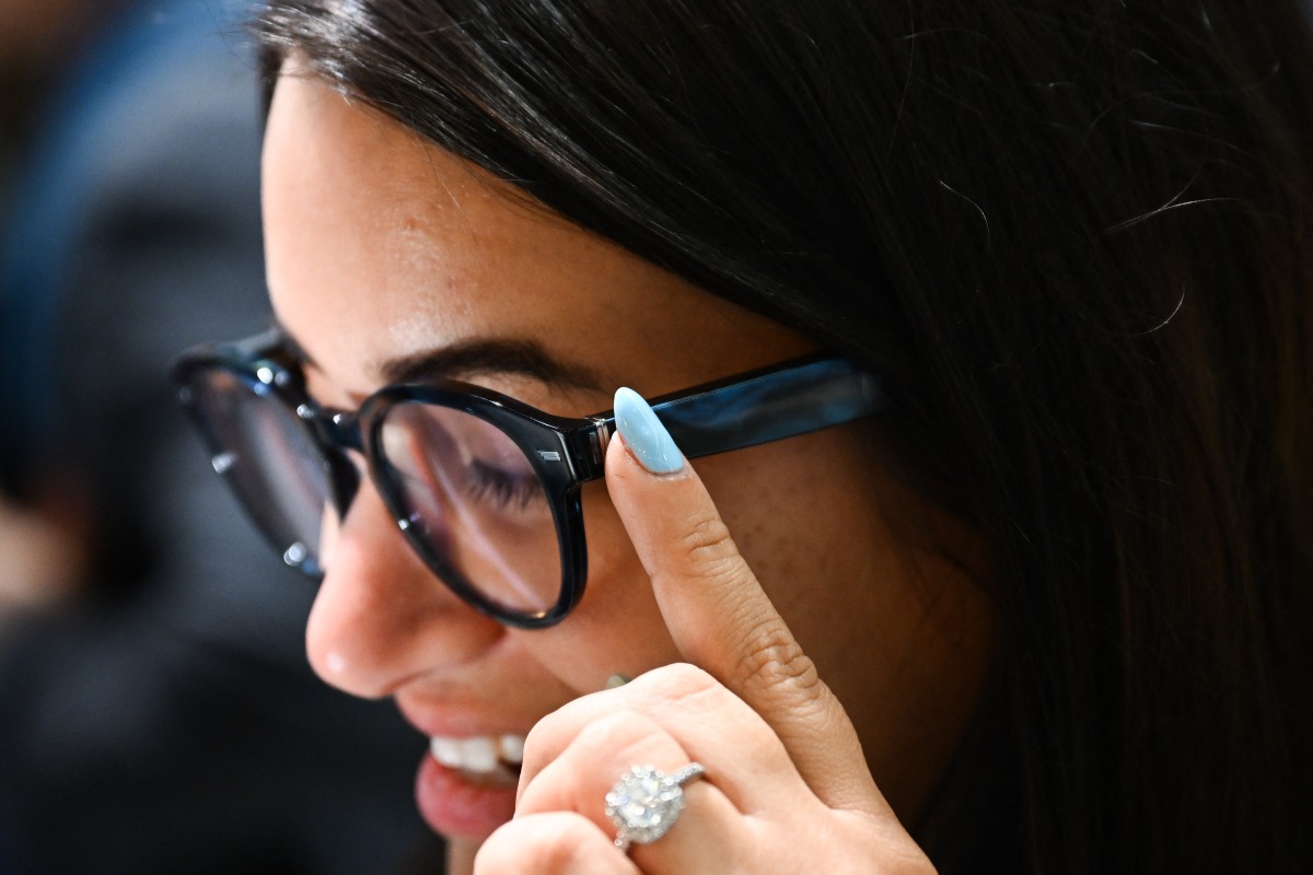 An attendee wears the Amazon Echo Frames smart glasses with Alexa during the Consumer Electronics Show (CES) in Las Vegas, Nevada on January 7, 2025. (Photo by Patrick T. Fallon / AFP)