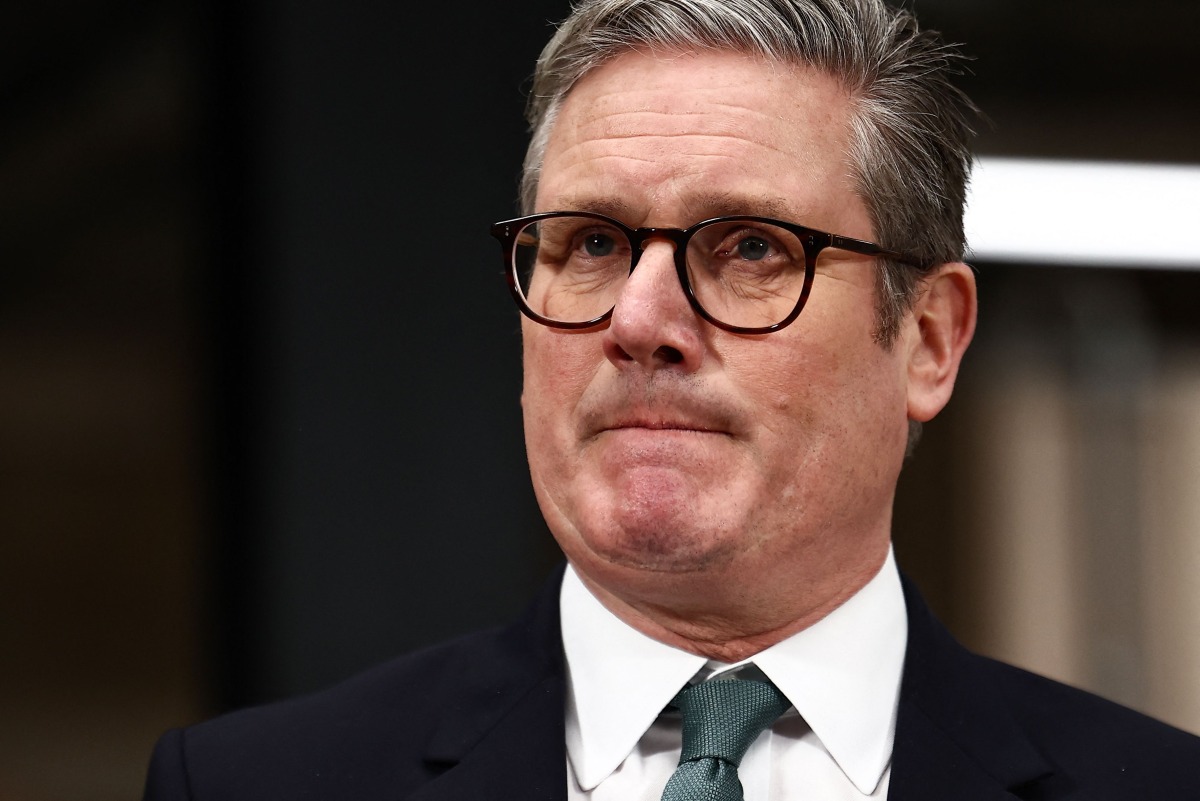 Britain's Prime Minister Keir Starmer reacts while delivering a speech during a visit of the Manufacturing Futures Lab at UCL (Unnivesrity College London), in London, on January 13, 2025. (Photo by HENRY NICHOLLS / POOL / AFP)
