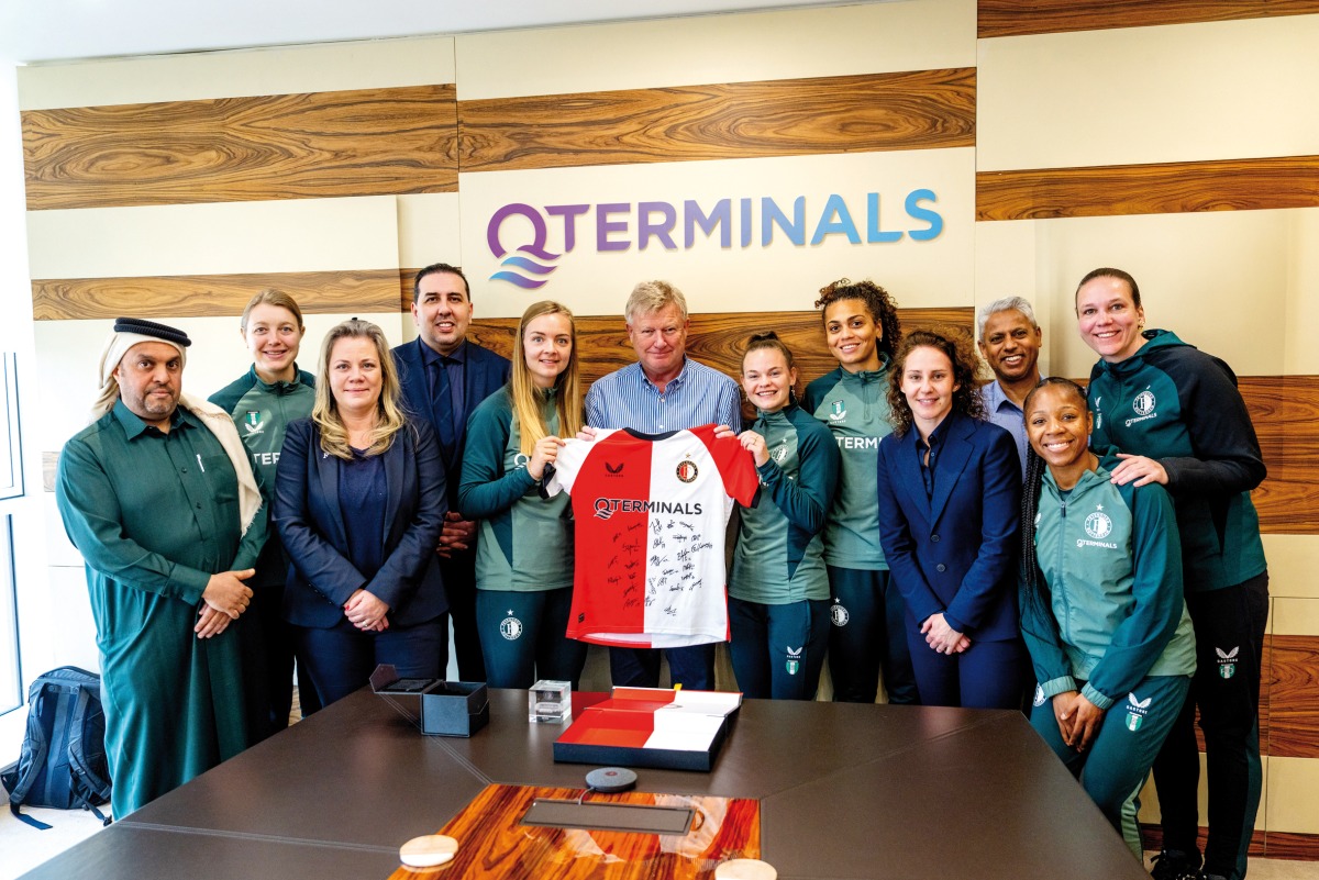 QTerminals officials with Feyenoord women’s team.