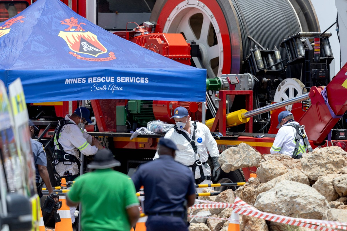 Rescuers use a Metalliferous Mobile Rescue Winder during a rescue operation to retrieve illegal miners from an abandoned gold mine in Stilfontein on January 14, 2025. (Photo by Christian Velcich / AFP)
