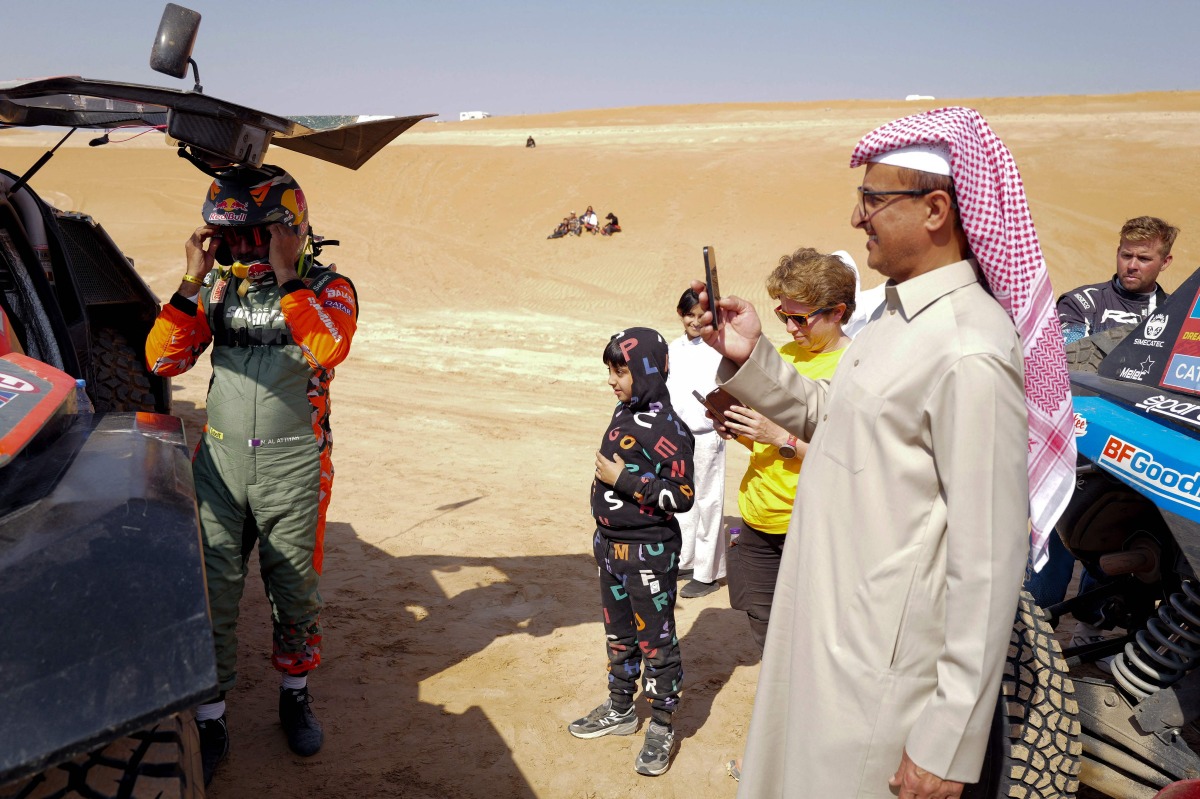 Qatar’s Nasser Al Attiyah (left) at the start of yesterday's stage. AFP