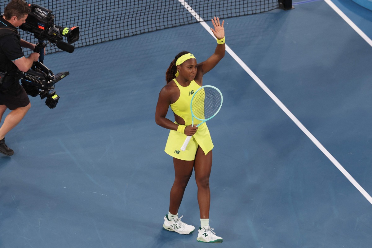 USA's Coco Gauff celebrates victory over Canada's Leylah Fernandez after their women's singles match on day six of the Australian Open tennis tournament in Melbourne on January 17, 2025. (Photo by DAVID GRAY / AFP)