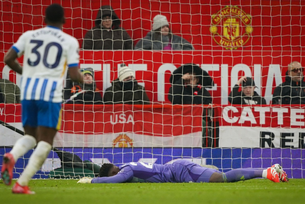 Manchester United's Cameroonian goalkeeper #24 Andre Onana reacts after failing to stop Brighton's third goal scored by Brighton's French midfielder #14 Georginio Rutter during the English Premier League football match between Manchester United and Brighton and Hove Albion at Old Trafford in Manchester, north west England, on January 19, 2025. (Photo by Ian HODGSON / AFP)