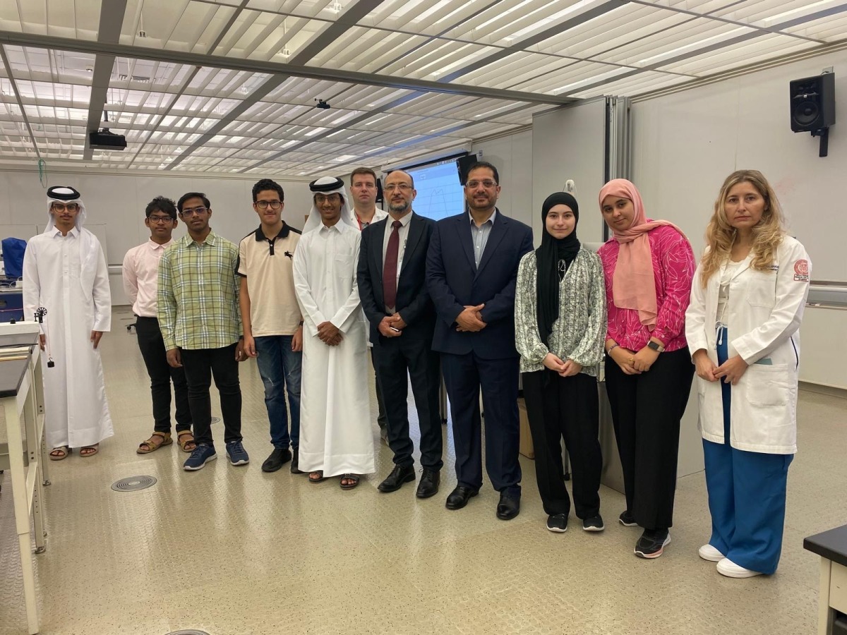 Dr. Mohammad Yousef, Hanan Saba, and Dr. Branislav Aleksic with the Qatari high school team.