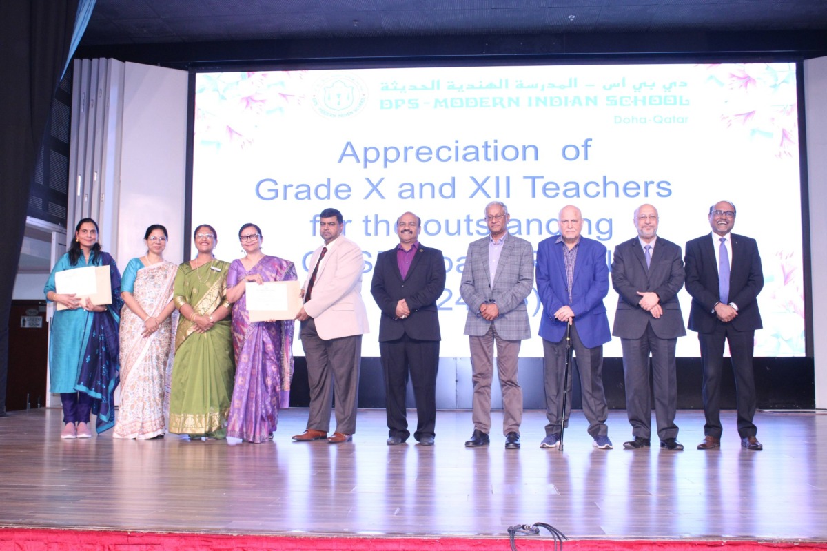 DPS Modern Indian School officials among others while receiving the certification.