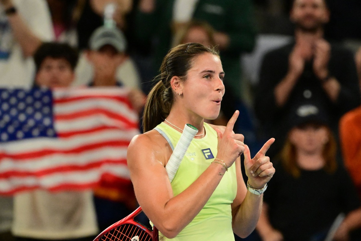 USA's Emma Navarro celebrates after her victory against Russia's Daria Kasatkina during their women's singles match on day nine of the Australian Open tennis tournament in Melbourne on January 20, 2025. (Photo by Yuichi YAMAZAKI / AFP)