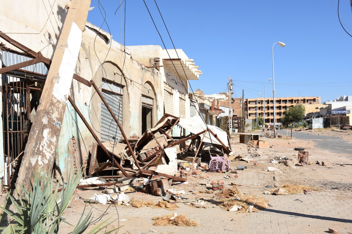 A picture taken on January 19, 2025 shows a general view of damaged shops and houses in Sudan's Al-Jazira state capital Wad Madani following its takeover by the army from paramilitary Rapid Support Forces (RSF). Photo for representational purposes only. (Photo by AFP)
