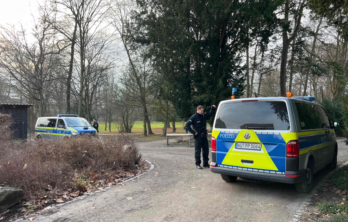 Police cars stand near the site of a stabbing in Aschaffenburg on January 22, 2025. Photo by Pascal HOEFIG / NEWS5 / AFP