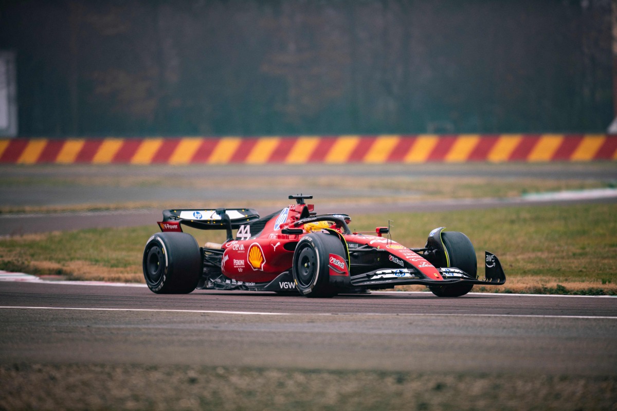 This handout picture released by Ferrari on January 22, 2024 shows F1 driver Lewis Hamilton testing the Ferrari F1SF 75 on the Fiorano circuit, at Maranello. (Photo by Handout / FERRARI / AFP)