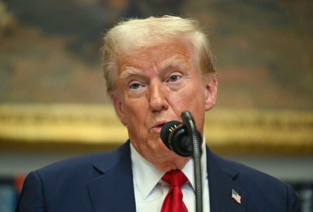 US President Donald Trump speaks in the Roosevelt Room at the White House on January 21, 2025, in Washington, DC. (Photo by Jim Watson / AFP)