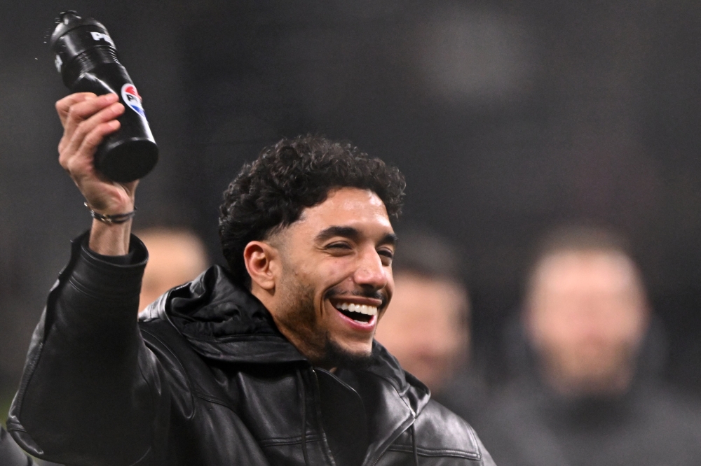 (Files) Frankfurt's Egyptian forward #07 Omar Marmoush reacts after the German first division Bundesliga football match on January 17, 2025. (Photo by Kirill Kudryavtsev / AFP)  