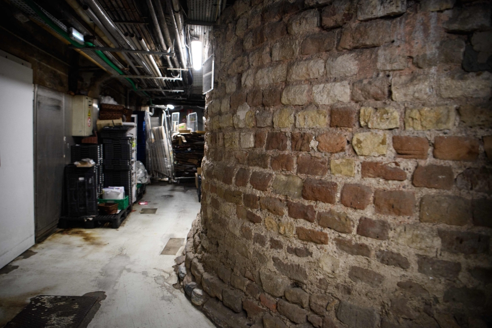 This photograph shows remains of a Roman Tower, located in a supermarket storage place in Strasbourg, eastern France, January 17, 2025. (Photo by Esa Rancel / AFP)
