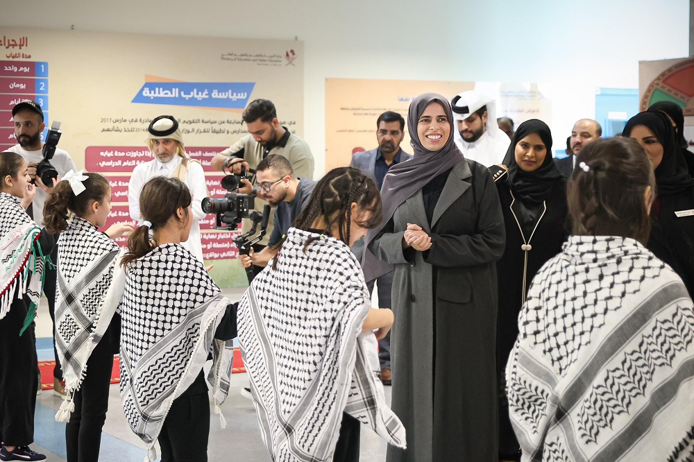 Minister of Education and Higher Education H E Lolwah bint Rashid Al Khater interacting with students during a visit to Audio Education Complex.