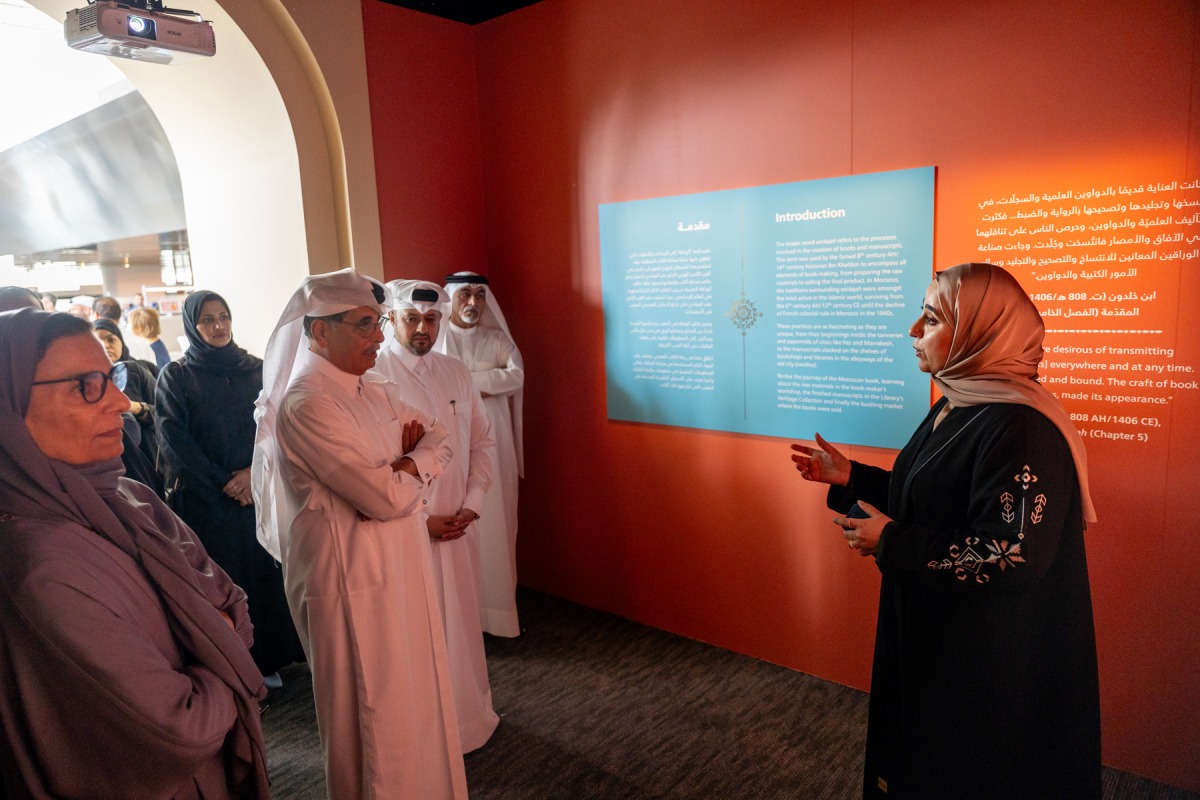 Minister of State and President of Qatar National Library H E Dr. Hamad bin Abdulaziz  Al Kawari and other officials during the exhibition opening. 