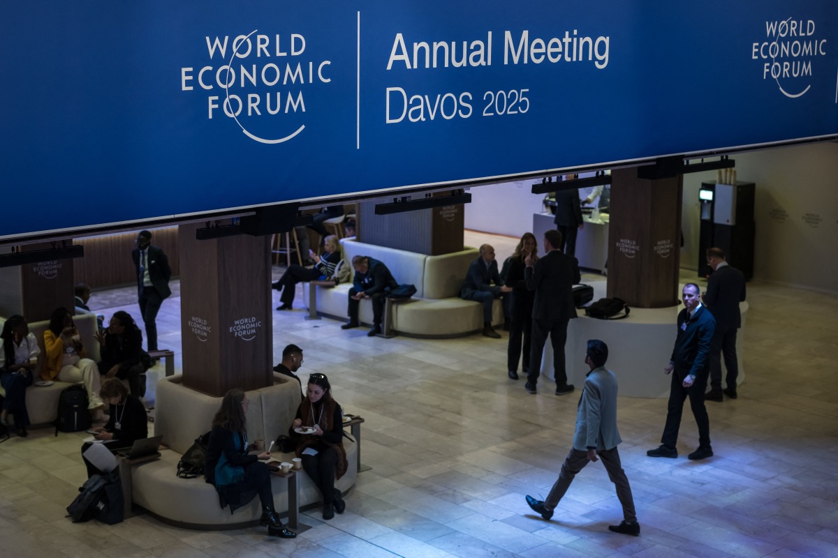 The photo shows signs of the World Economic Forum (WEF) at the Congress center, during the WEF annual meeting in Davos. (AFP)