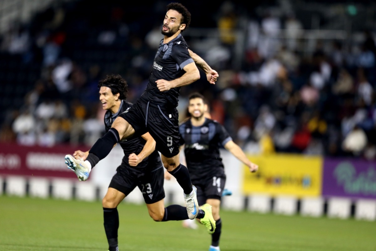 Qatar SC players celebrate after defeating Al Sadd yesterday.