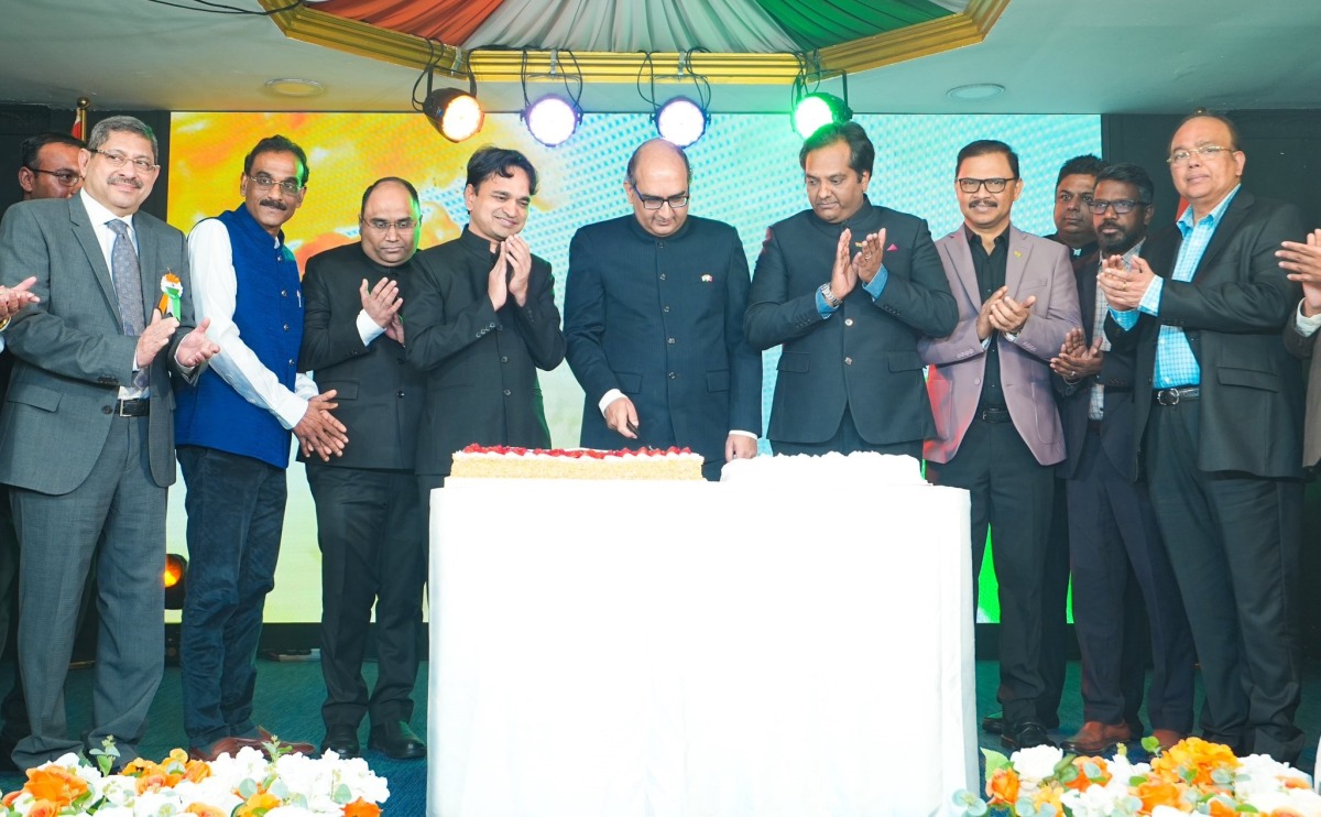 Ambassador of India to Qatar H E Vipul (centre) cutting a cake to mark the 76th Republic Day of India at ICC premises yesterday.