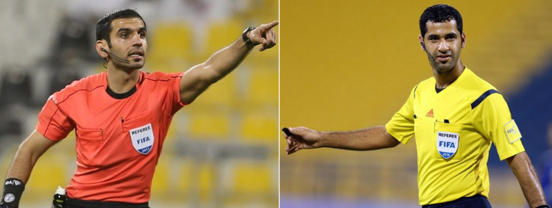 Qatari referees Abdulrahman Al Jassim (right) and Salman Falahi 